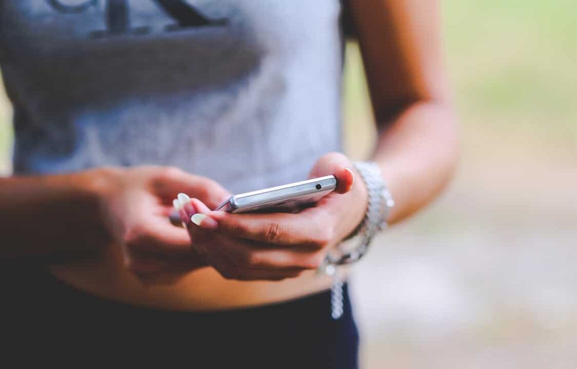 holding-cell-phone-in-hand